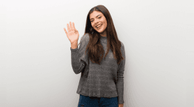 woman-waving-goodbye
